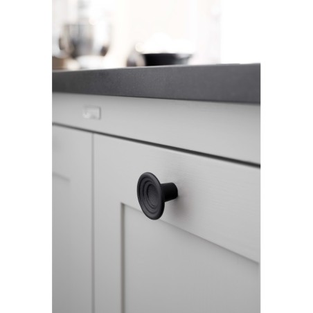 Knob FLEUR used on interior furniture.