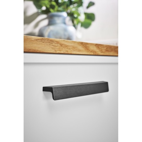 Handle ENVELOPE used on interior furniture.