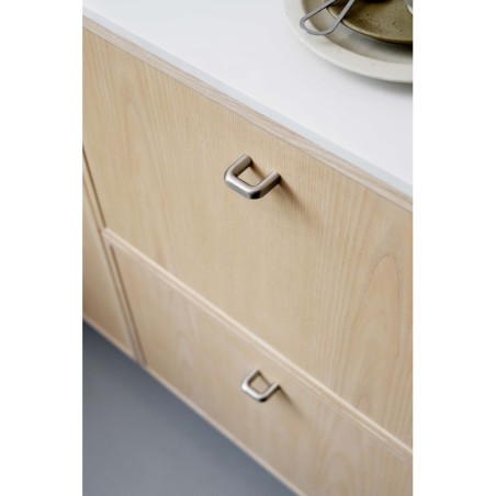 Knob UNIFY used on interior furniture.